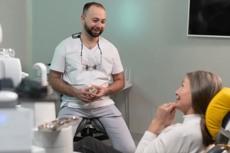 Certified ZAGA Doctor Taras Yurov, from ZAGA Center Saint Petersburg, attending an elderly patient