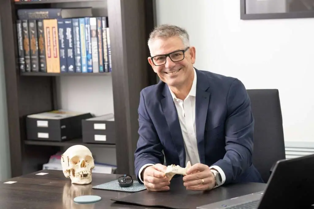 Dr. Zahi Khouri on his desk – Oral & Maxillofacial Surgeon in Adelaide