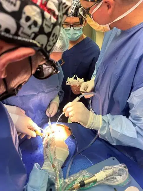 Performing surgery on a patient - ZAGA Center Adelaide